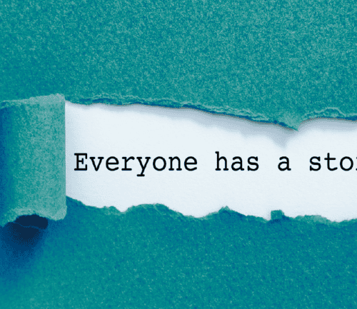 Torn teal paper revealing white background with "Everyone has a story..." text