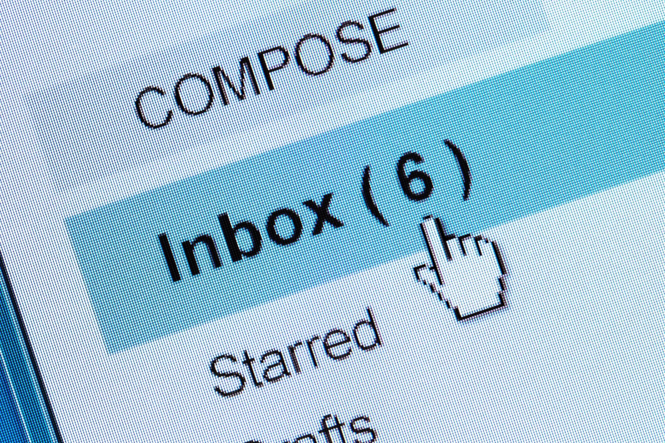 Close-up of email inbox showing "COMPOSE" button and starred message count