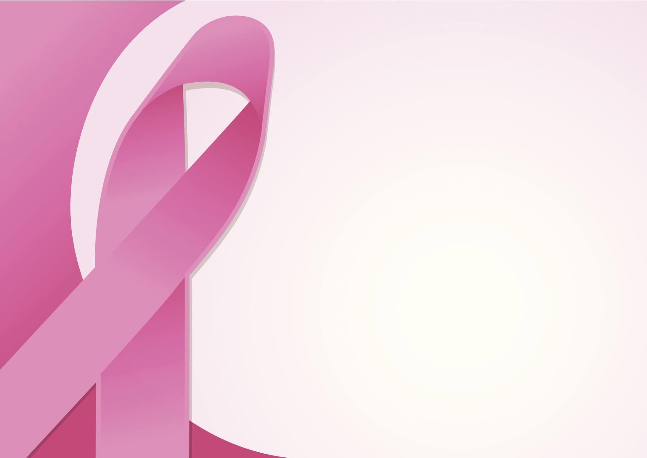 Pink breast cancer awareness ribbon on gradient pink background