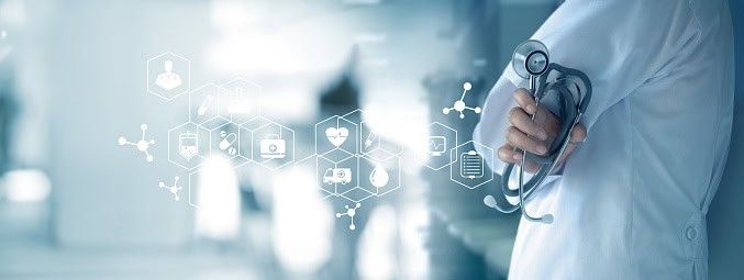 Doctor holding stethoscope with digital healthcare icons and medical symbols overlay