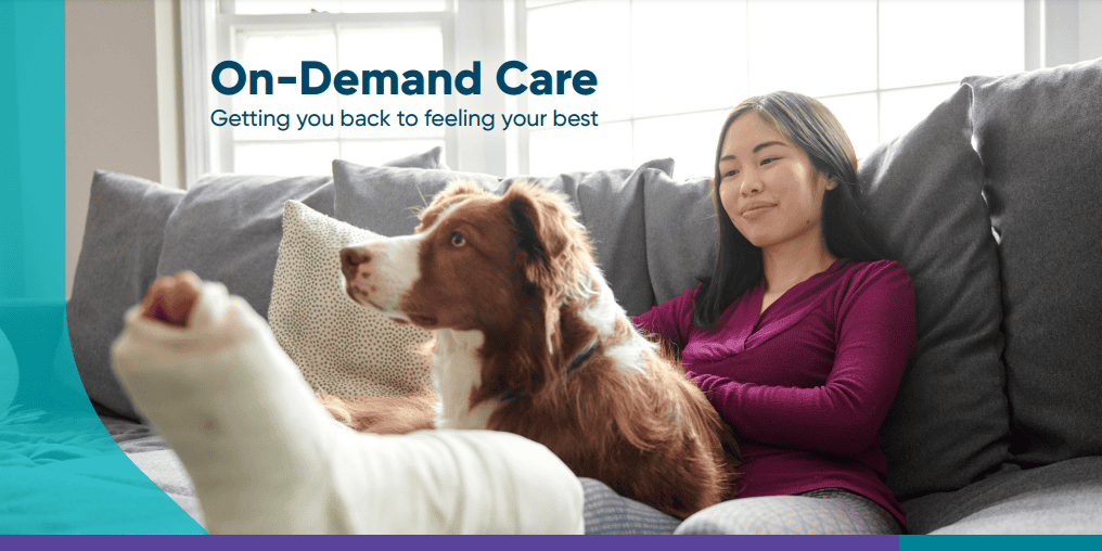 Woman resting on couch with dog, promoting Kettering Health's on-demand care services