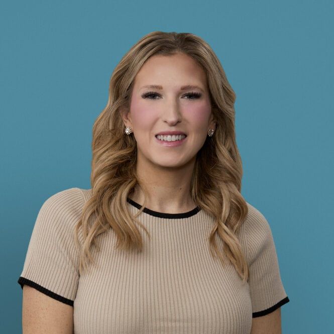 Professional headshot of Courtney Pemberton, APRN-CNP, smiling in beige ribbed sweater
