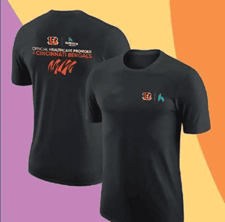 Two black t-shirts featuring Cincinnati Bengals and Kettering Health partnership logos displayed together