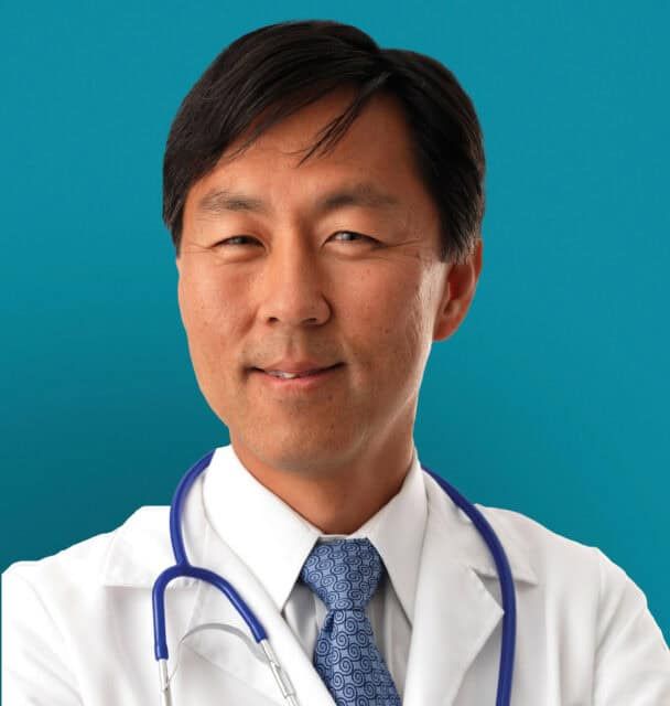 Professional headshot of Dr. Eugene S. Chung in white coat with stethoscope