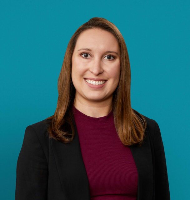 Professional headshot of Hannah Carr, PA-C, wearing black blazer and burgundy top