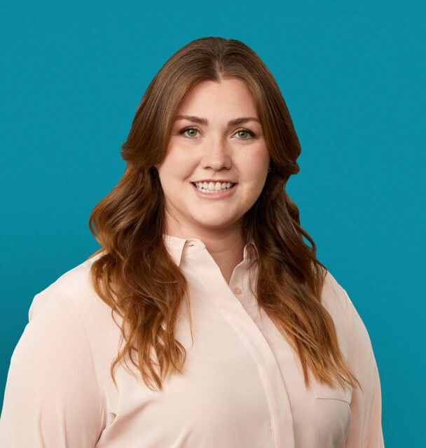 Professional headshot of Mariah Lopez, PA-C in light pink blouse against teal background