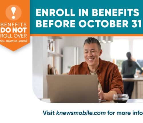 Man working on laptop with benefits enrollment deadline reminder October 31