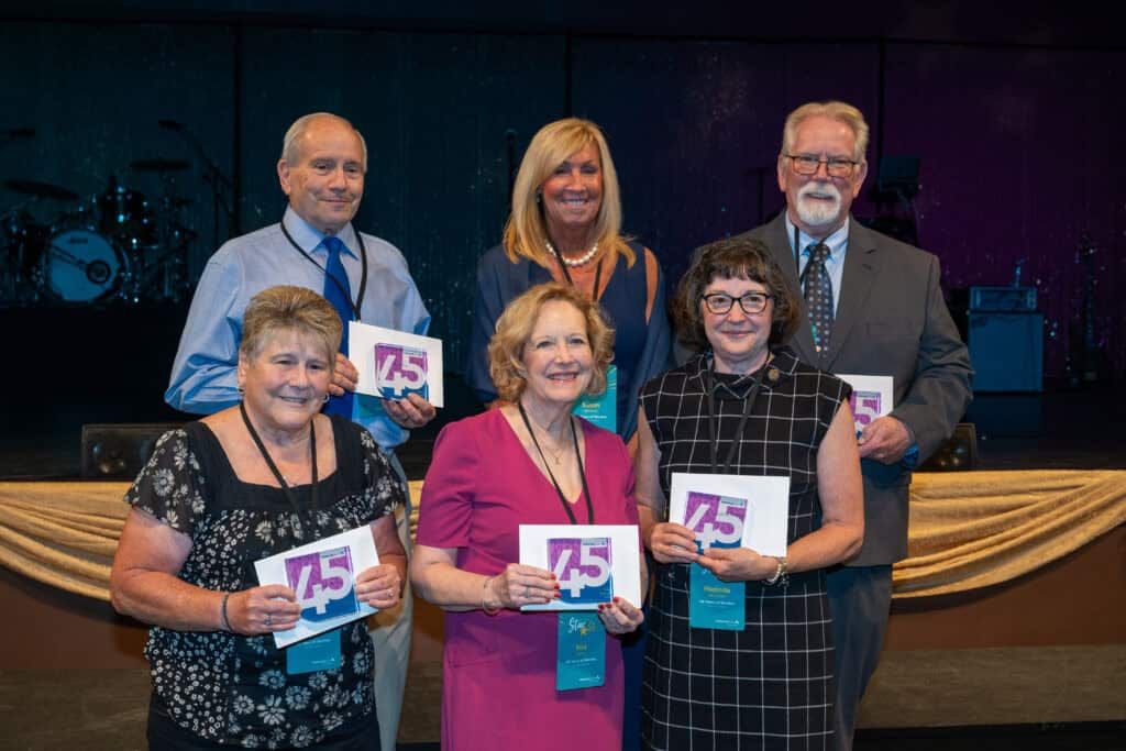 45-year employees holding their awards