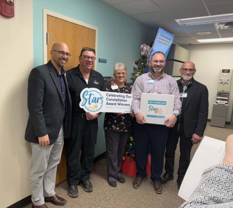 Plant Maintenance posing for picture for Constellation Award