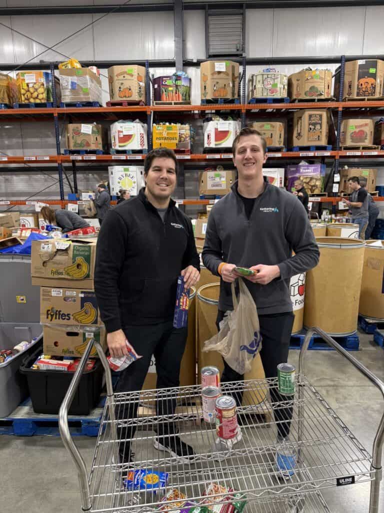Sports Medicine staff sorting food at The Foodbank