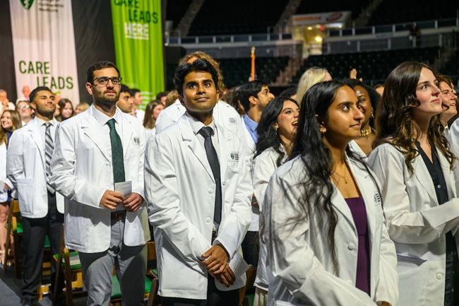 Ohio University medical students standing and smiling