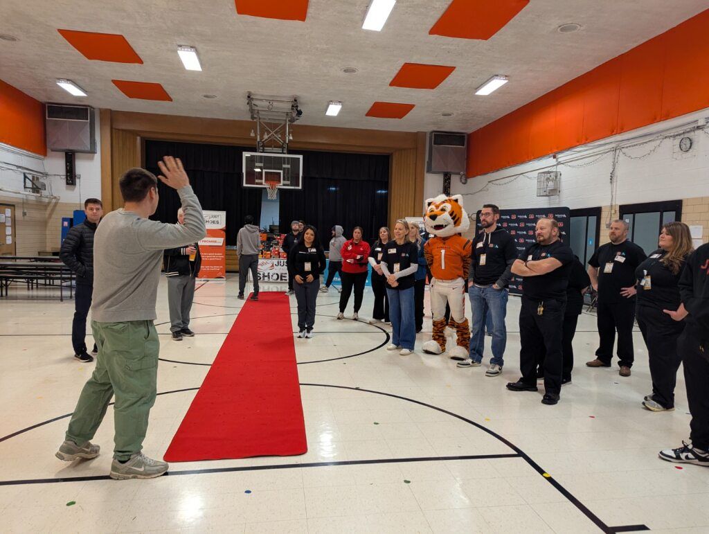 Group standing in a gym