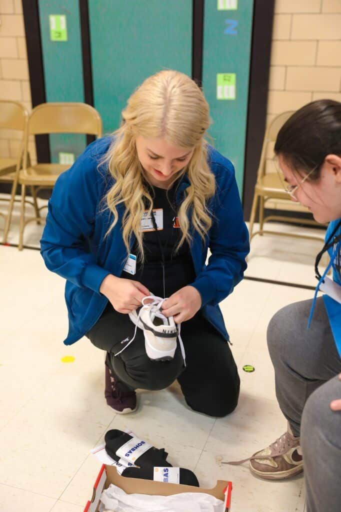 Child trying on shoes