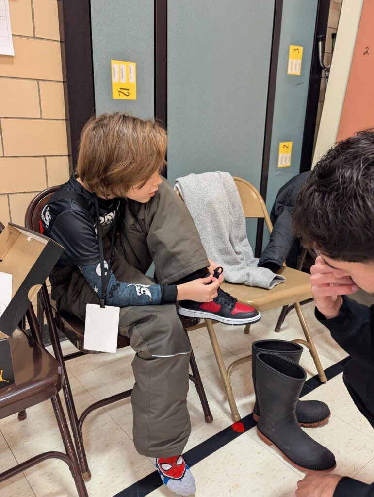 Child trying on shoes