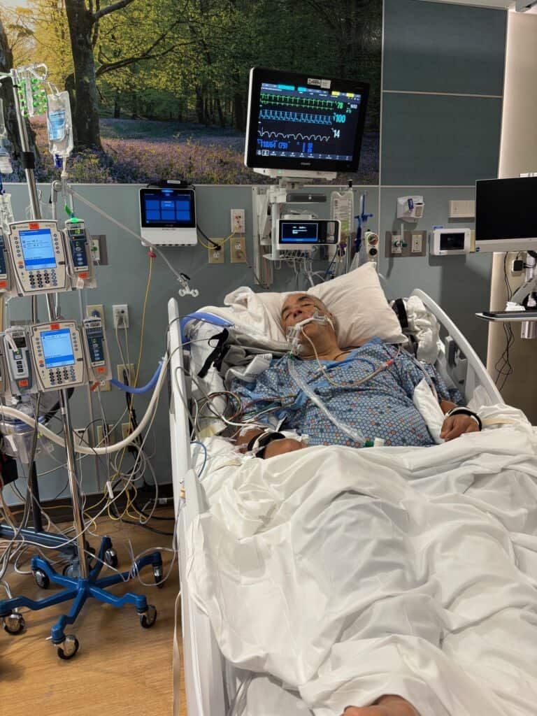 Steve in a hospital bed