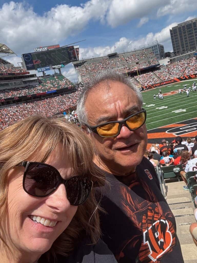 Steve and his wife at a Cincinnati Bengals game