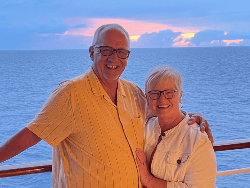 Jeff Koopman posing with his wife