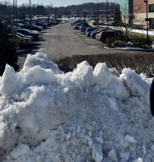 Mound of snow in a parking lot