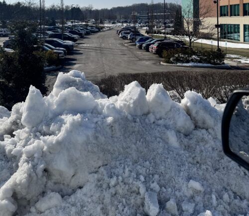 Mound of snow in a parking lot