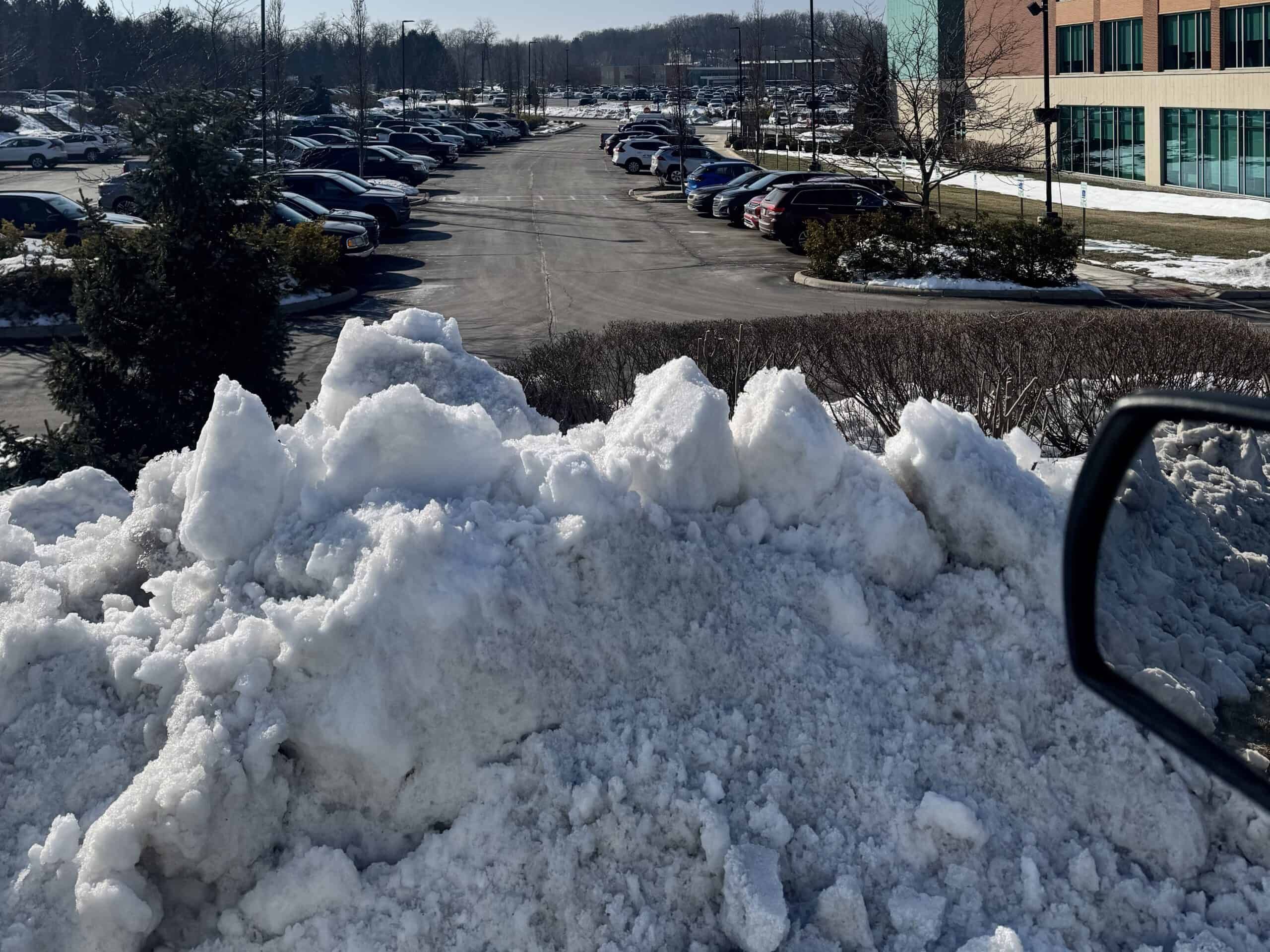 Mound of snow in a parking lot