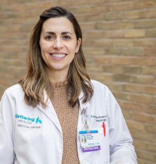 Dr. Daniela Rosu, cardiologist, smiling at camera