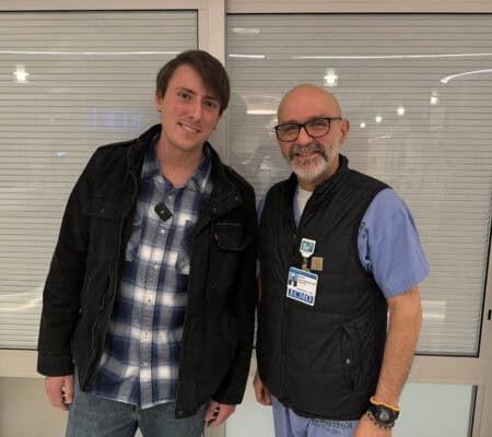 Trevor, patient, standing with Dr. Garcia-Montilla, ECMO expert
