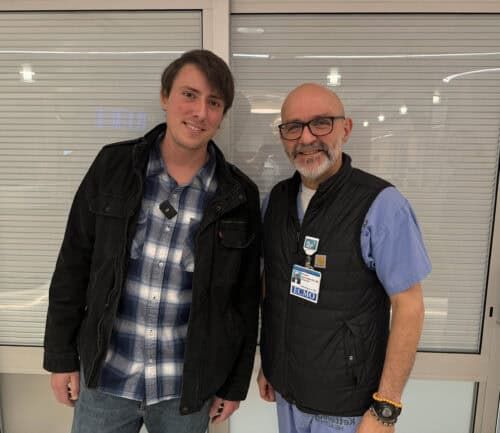 Trevor, patient, standing with Dr. Garcia-Montilla, ECMO expert