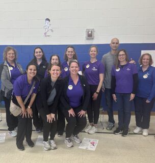 Kettering Health’s Therapy and Sports Medicine team volunteers with Shoes 4 the Shoeless.