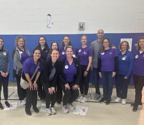 Kettering Health’s Therapy and Sports Medicine team volunteers with Shoes 4 the Shoeless.