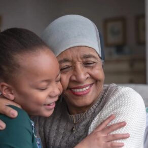 Woman with cancer spending time with her granddaughter