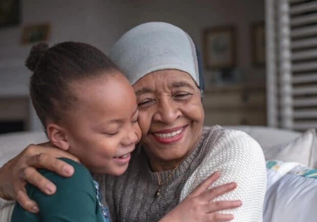 Woman with cancer spending time with her granddaughter