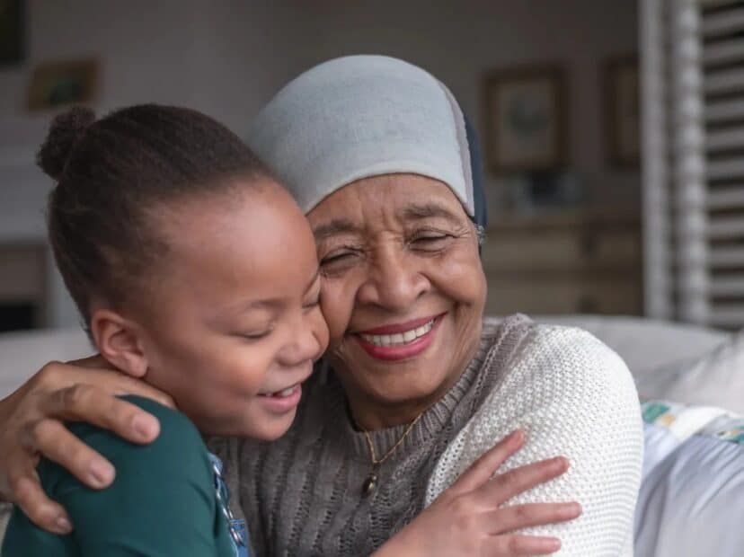 Woman with cancer spending time with her granddaughter