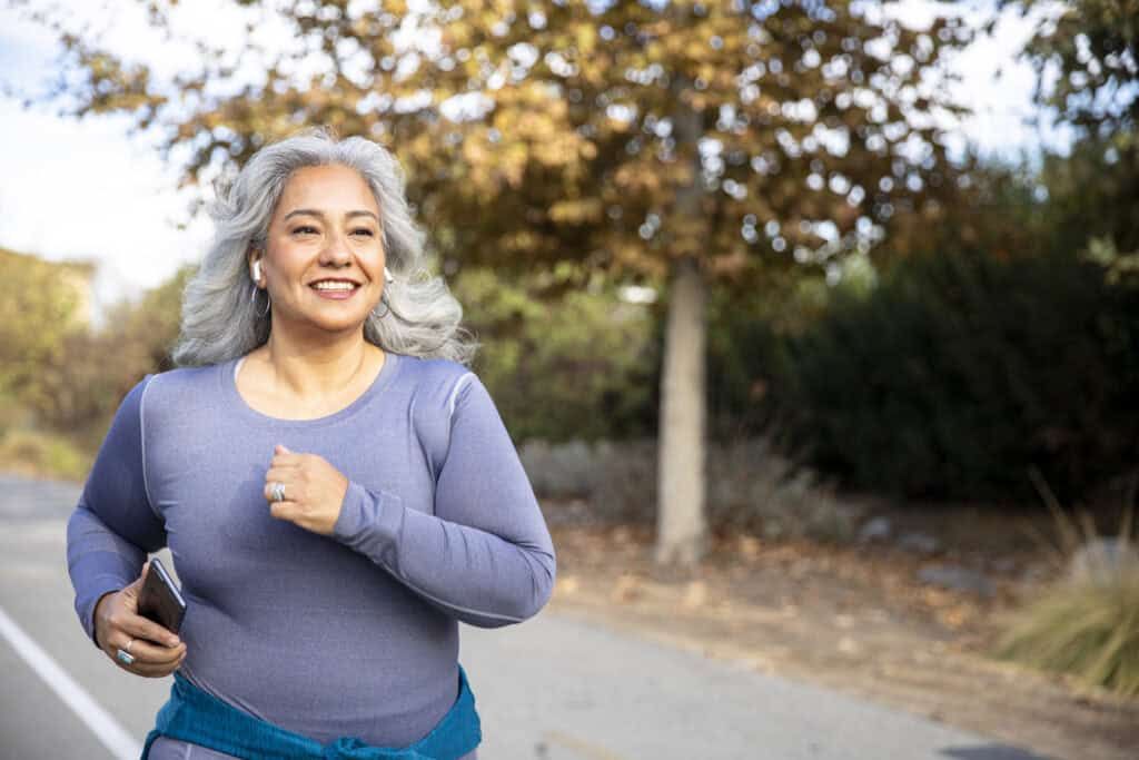 Woman walking on a bike path