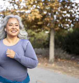 Woman walking on a bike path