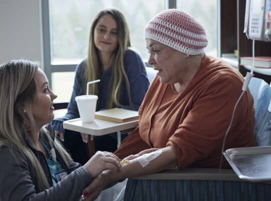 Nurse talking with Cancer Patient