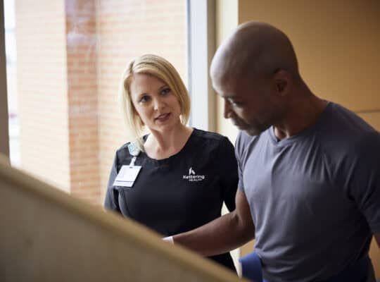 Physical therapist working with a patient