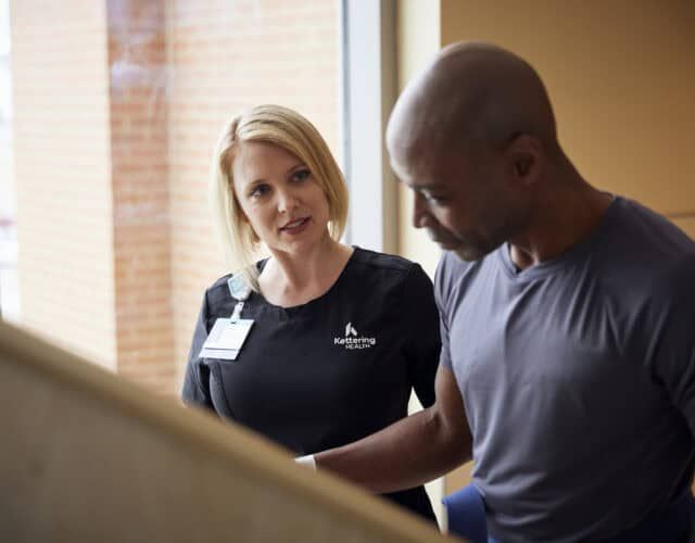 Physical therapist working with a patient