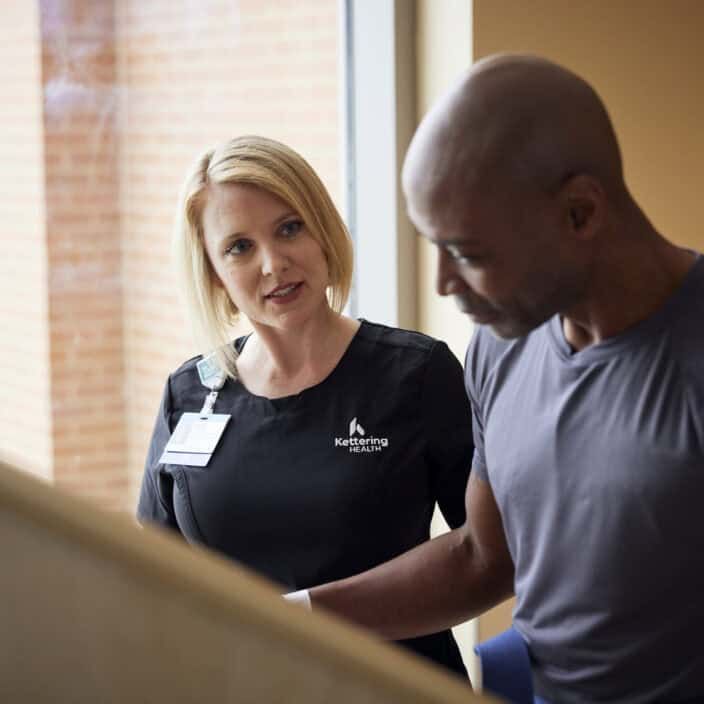 Physical therapist working with a patient