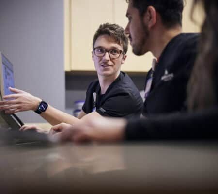 Respiratory therapist training a new employee