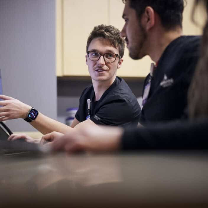 Respiratory therapist training a new employee