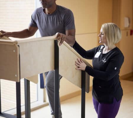 Physical therapist working with a patient