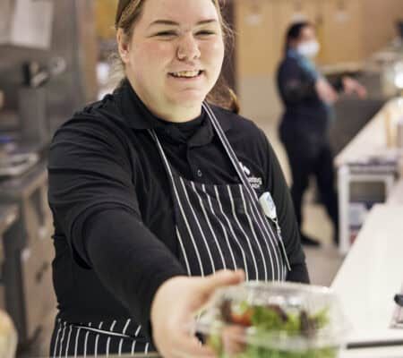 Culinary specialist with a salad