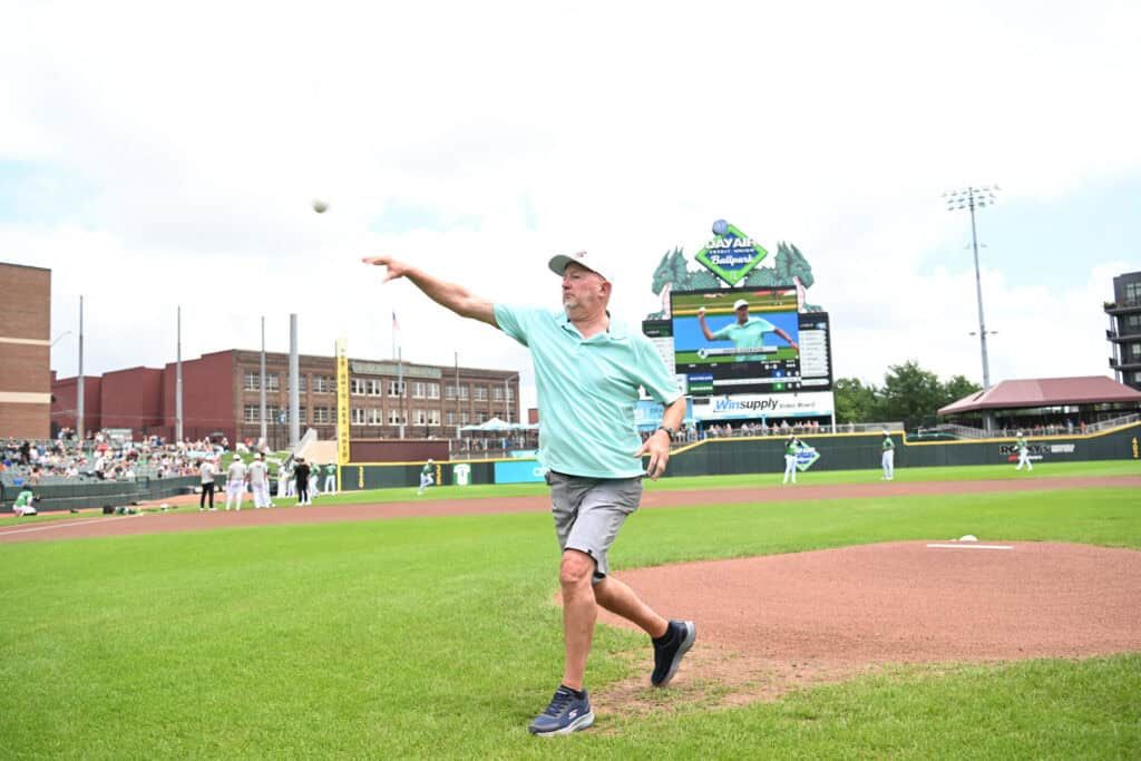 David Cookson throwing the first pitch at the Sports Med Game at the Dayton Dragons stadium