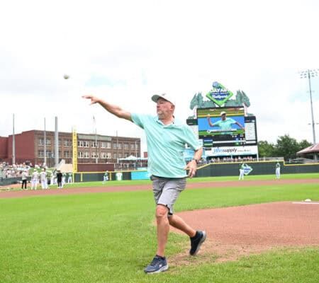 David Cookson throwing the first pitch at the Sports Med Game at the Dayton Dragons stadium