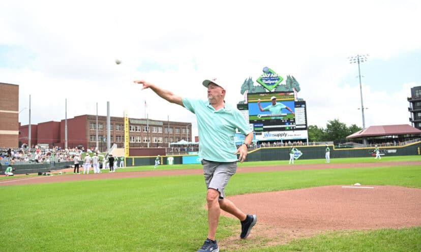 David Cookson throwing the first pitch at the Sports Med Game at the Dayton Dragons stadium