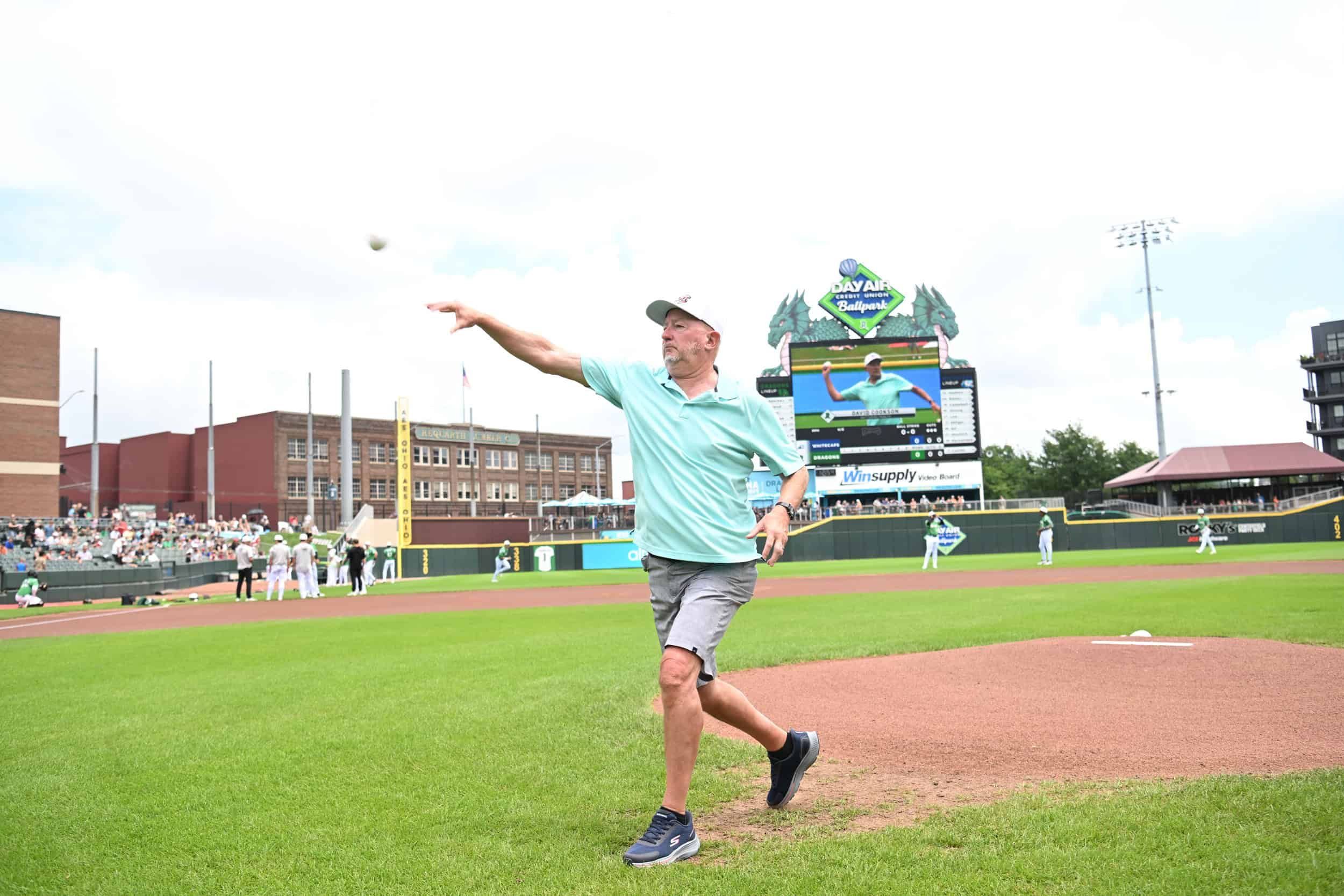 David Cookson throwing the first pitch at the Sports Med Game at the Dayton Dragons stadium