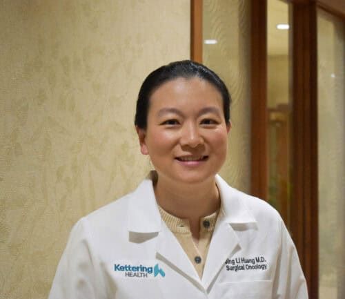 Dr. Jing Li Huang smiles for a photo.