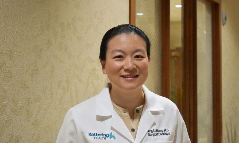 Dr. Jing Li Huang smiles for a photo.
