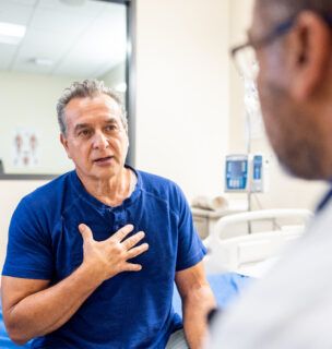 A senior man and doctor having a conversation about health