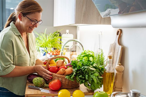 Women organizing vegetables